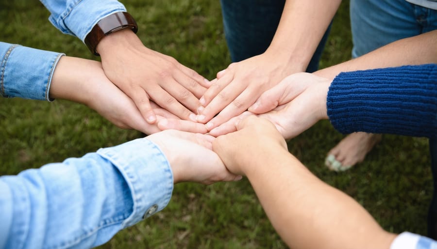 Christian community gathering in prayer circle offering support