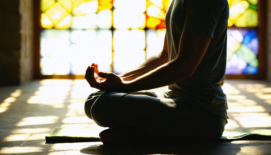 Christian practitioner in mindful prayer under colorful stained glass window light